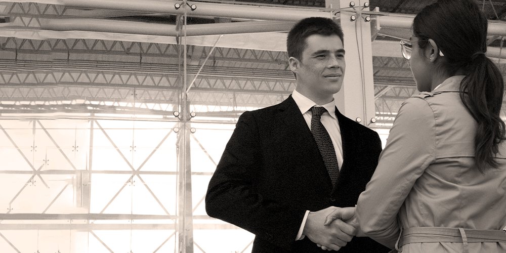 Professional partnership meeting handshake